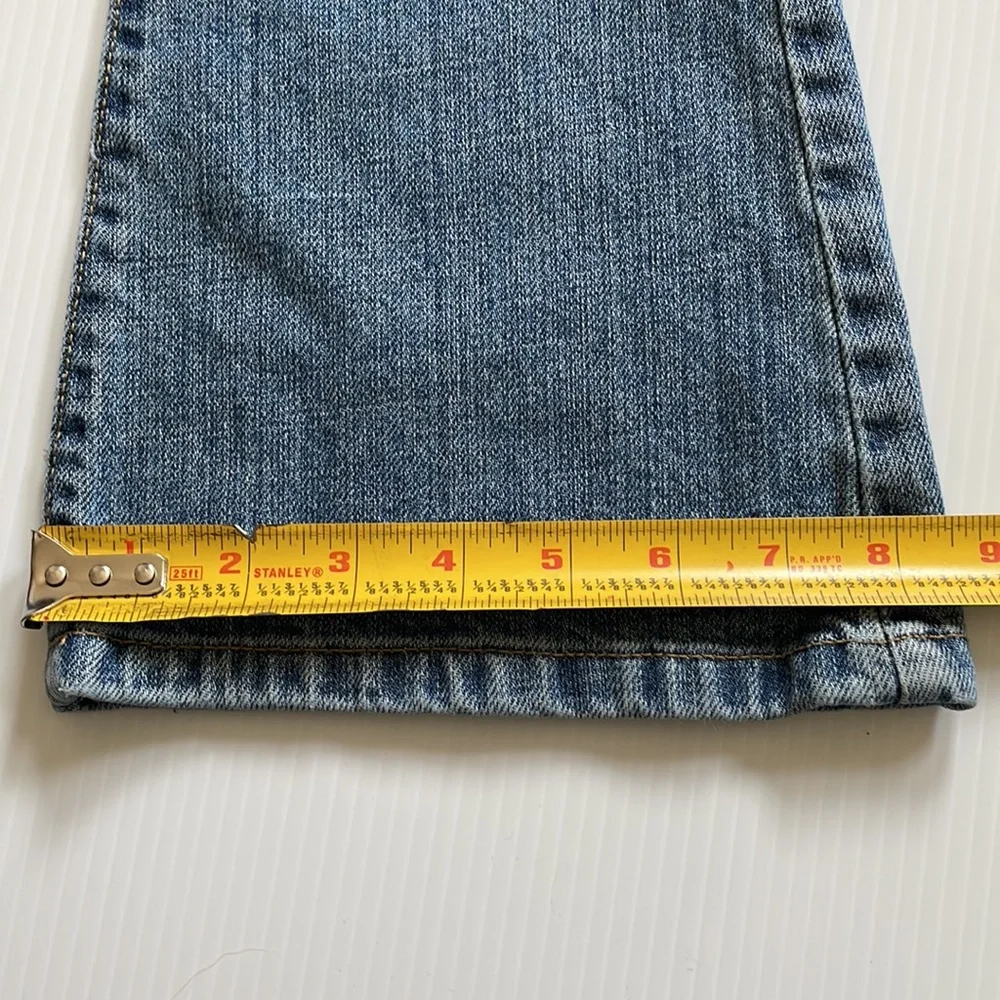 Gymboree flared jeans with gem buttons.  Girls size 7